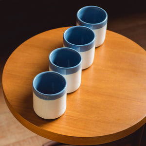 Four tea cups (Blue Edge)