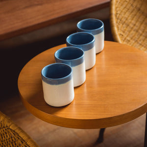 Four tea cups (Blue Edge)
